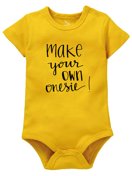 A yellow bodysuit with the text 'MAKE YOUR OWN ONESIE' printed in black.